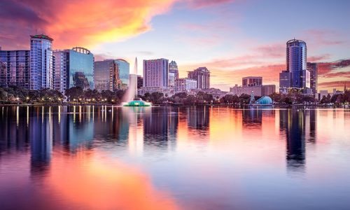 Orlando, Florida, USA downtown city skyline from Eola Park.