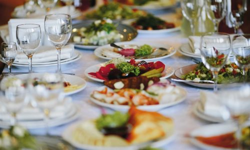 Plates with variety food on the celebration table